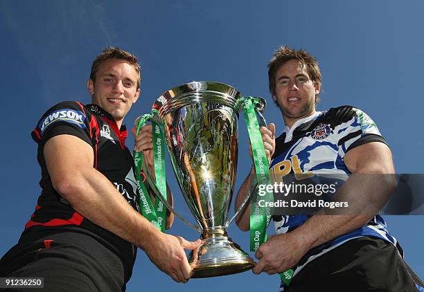 Mike Blair of Edinburgh holds the trophy with Butch James during the Heineken Cup UK Launch at the Madejski Stadium on September 29, 2009 in Reading,...