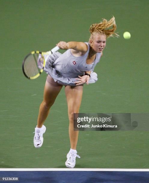 Caroline Wozniacki of Denmark serves in her match against Aleksandra Wozniak of Canada during the third day of the Toray Pan Pacific Open Tennis...