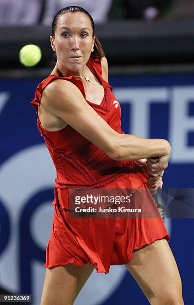 Jelena Jankovic of Serbia plays a backhand in her match against Sabine Lisicki of Germany during the third day of the Toray Pan Pacific Open Tennis...