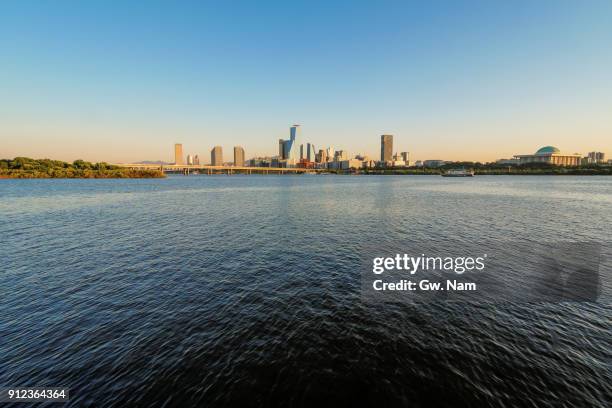 urban skyline seen far - mapo bridge stock pictures, royalty-free photos & images