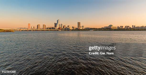 urban skyline seen far - mapo bridge stock pictures, royalty-free photos & images