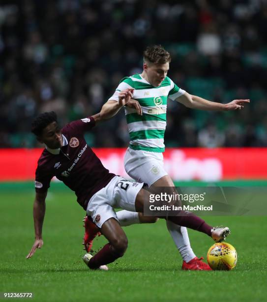 James Forrest of Celtic vies with Demi Mitchell of Heart of Midlothian during the Scottish Premier League match between Celtic and Heart of...