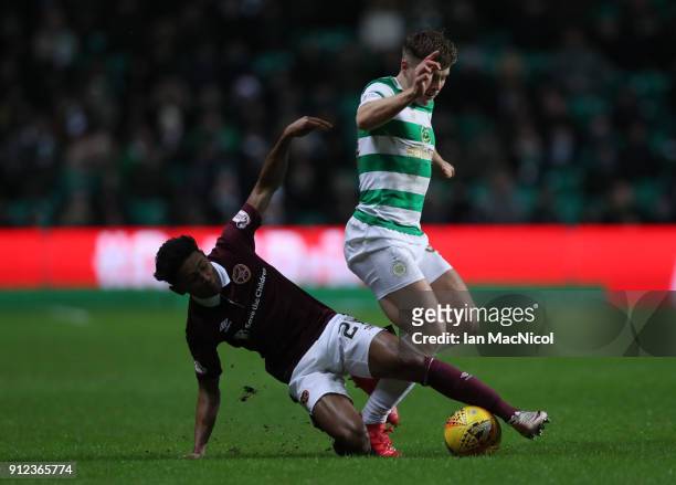 James Forrest of Celtic vies with Demi Mitchell of Heart of Midlothian during the Scottish Premier League match between Celtic and Heart of...