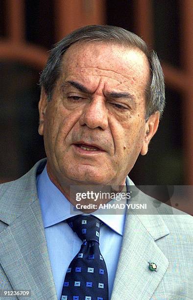 In this picture taken December 13 Italian businessman Ottavio Quattrocchi leaves the High Court in Kuala Lumpur. The Indian government said September...