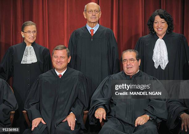 Justices of the US Supreme Court pose for their official photo on September 29, 2009 at the Supreme Court in Washington,DC. Font row L-R:, Chief...