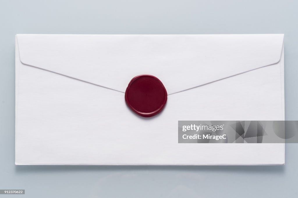 White Envelope Sealed with Wax Stamp