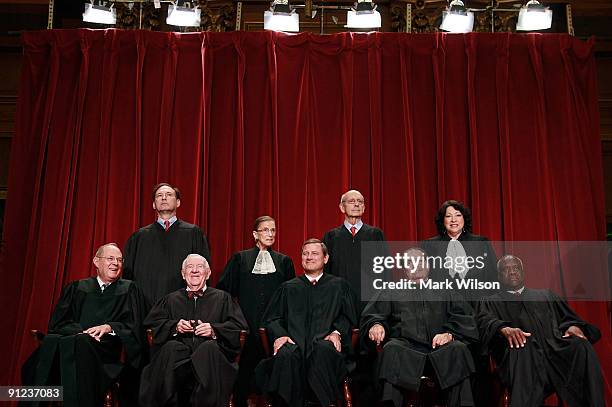 Members of the US Supreme Court pose for a group photograph at the Supreme Court building on September 29, 2009 in Washington, DC. Front row :...