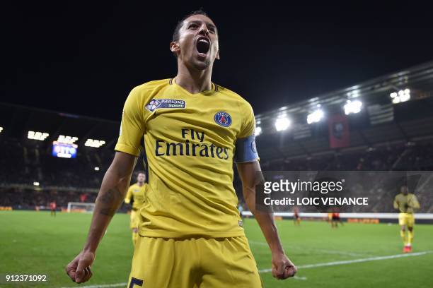 Paris Saint-Germain's Brazilian defender Marquinhos reacts after scoring a goal during the French League Cup football semi-final match between Rennes...