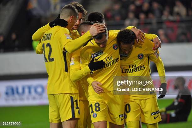 Paris Saint-Germain's Argentinian midfielder Paris Saint-Germain's Argentinian midfielder Giovanni Lo Celso celebrates with teammates after scoring a...