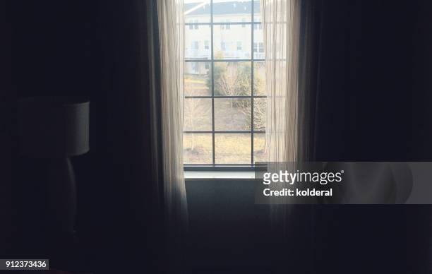 ambient light. window with curtains. bedroom early morning - ambient light stock pictures, royalty-free photos & images