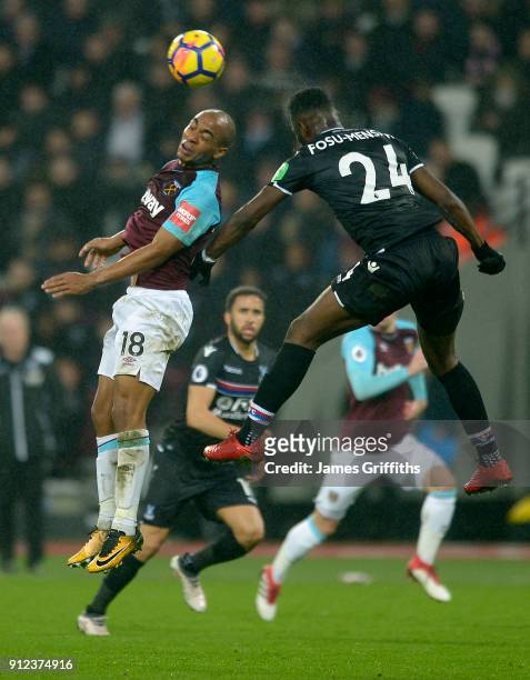 Joao Mario of West Ham United in action with Timothy Fosu-Mensah of Crystal Palace during the Premier League match between West Ham United and...