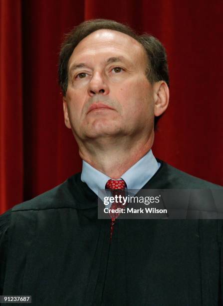 Associate Justice Samuel Alito Jr. Poses during a group photograph at the Supreme Court building on September 29, 2009 in Washington, DC. The high...