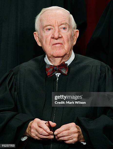 Associate Justice John Paul Stevens poses during a group photograph at the Supreme Court building on September 29, 2009 in Washington, DC. The high...