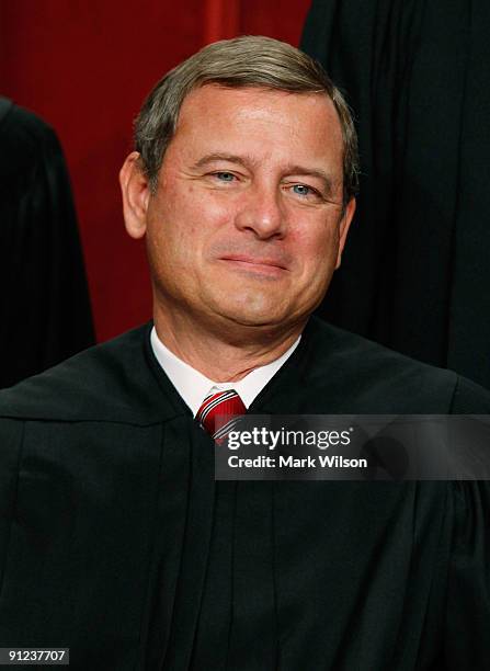 Chief Justice John G. Roberts poses for a group photograph at the Supreme Court building on September 29, 2009 in Washington DC. The high court made...