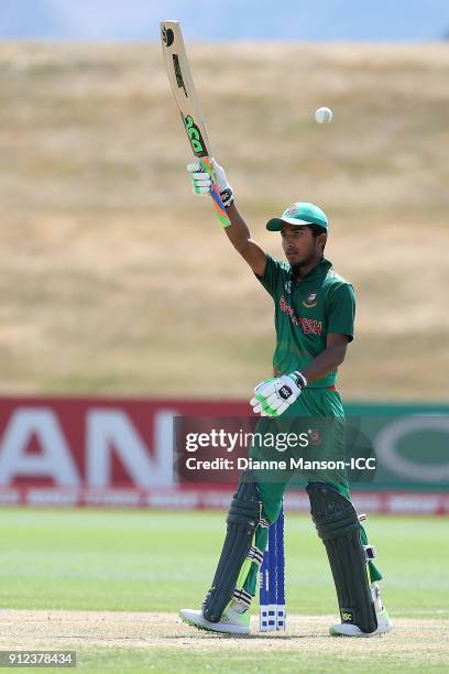 Afif Hossain Dhrubo of Bangladesh celebrates his half century during the ICC U19 Cricket World Cup 5th Playoff match between South Africa and...