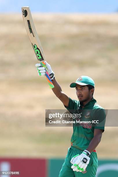 Afif Hossain Dhrubo of Bangladesh celebrates his half century during the ICC U19 Cricket World Cup 5th Playoff match between South Africa and...