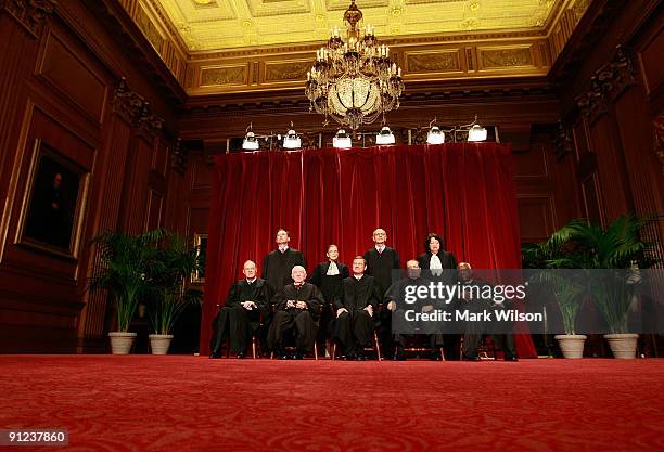 Members of the US Supreme Court pose for a group photograph at the Supreme Court building on September 29, 2009 in Washington, DC. Front row :...
