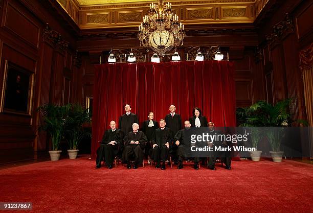 Members of the US Supreme Court pose for a group photograph at the Supreme Court building on September 29, 2009 in Washington, DC. Front row :...