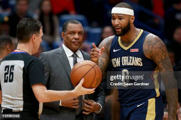 DeMarcus Cousins of the New Orleans Pelicans argues a call with referee Pat Fraher during a NBA game against the Houston Rockets at the Smoothie King...