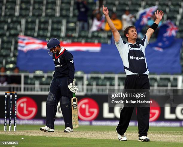 Shane Bond of New Zealand celebrates the wicket of Ravi Bopara during The ICC Champions Trophy Group B Match between England and New Zealand at...