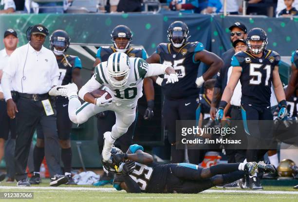 Jermaine Kearse of the New York Jets in action against Tashaun Gipson of the Jacksonville Jaguars on October 1, 2017 at MetLife Stadium in East...
