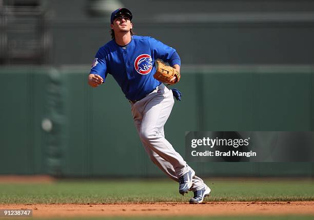 Ryan Theriot of the Chicago Cubs chases a pop up against the San Francisco Giants during the game at AT&T Park on September 27, 2009 in San...