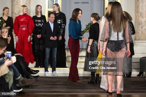 Crown Princess Mary of Denmark presents second prize to designer Hanna-Maaria Sinkkonen from Finland at Designers' Nest award show during Copenhagen...