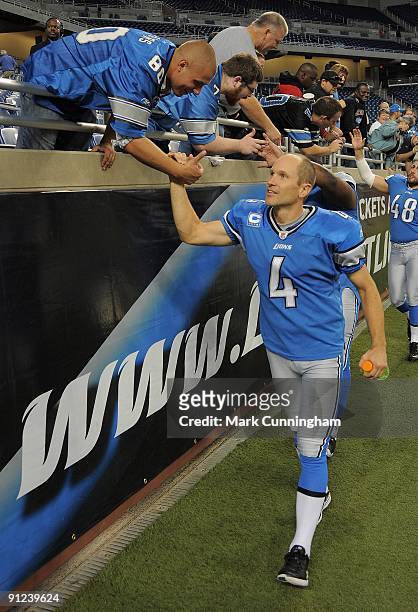 Jason Hanson of the Detroit Lions shakes hands with fans after the victory against the Washington Redskins at Ford Field on September 27, 2009 in...