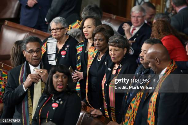 Members of Congress wear black clothing and Kente cloth in protest before the State of the Union address in the chamber of the U.S. House of...