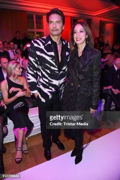 Marcus Schenkenberg, Pat Cleveland during the Gianni Versace Retrospective opening event at Kronprinzenpalais on January 30, 2018 in Berlin, Germany....