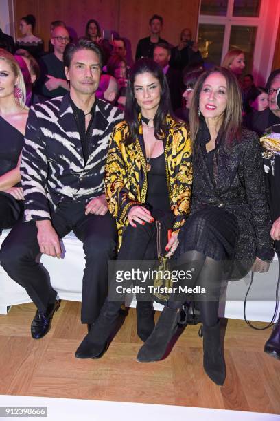 Marcus Schenkenberg, Shermine Shahrivar, Pat Cleveland during the Gianni Versace Retrospective opening event at Kronprinzenpalais on January 30, 2018...