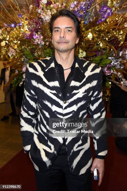 Marcus Schenkenberg during the Gianni Versace Retrospective opening event at Kronprinzenpalais on January 30, 2018 in Berlin, Germany. The exhibition...