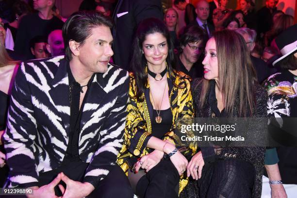 Marcus Schenkenberg, Shermine Shahrivar, Pat Cleveland during the Gianni Versace Retrospective opening event at Kronprinzenpalais on January 30, 2018...