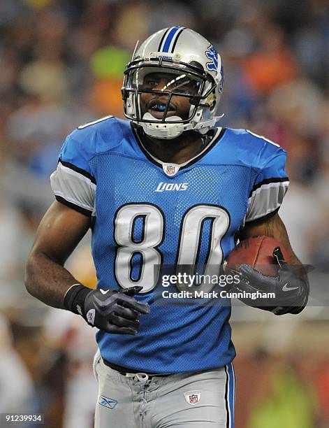 Bryant Johnson of the Detroit Lions looks on and smiles after scoring a touchdown against the Washington Redskins at Ford Field on September 27, 2009...