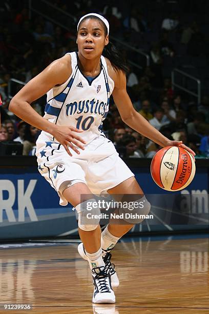 Lindsey Harding of the Washington Mystics moves the ball against the Atlanta Dream during the game at the Verizon Center on September 12, 2009 in...