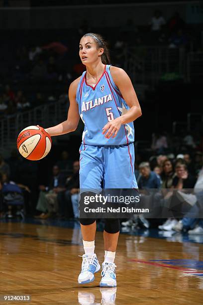 Shalee Lehning of the Atlanta Dream moves the ball against the Washington Mystics during the game at the Verizon Center on September 12, 2009 in...