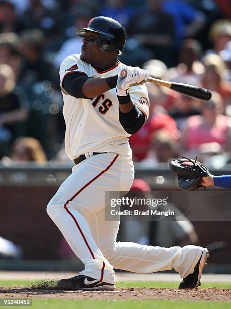 Juan Uribe of the San Francisco Giants bats against the Chicago Cubs during the game at AT&T Park on September 26, 2009 in San Francisco, California.