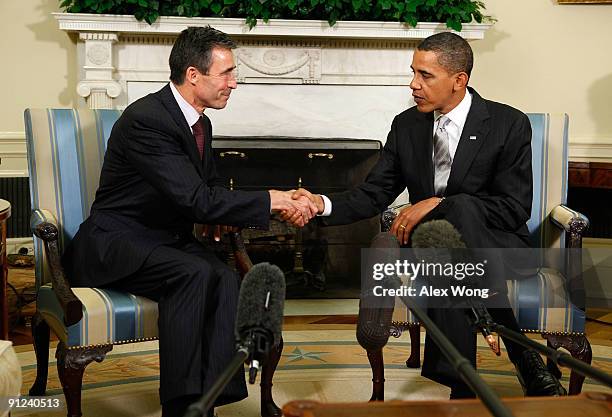 President Barack Obama shakes hands with NATO Secretary General Anders Fogh Rasmussen in the Oval Office at the White House September 29, 2009 in...