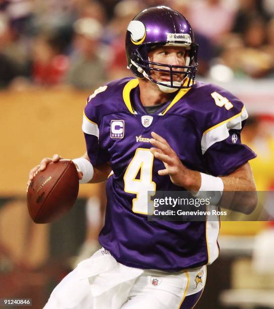 Quarterback Brett Favre of the Minnesota Vikings prepares to throw the ball during the game against the San Francisco 49ers at Hubert H. Humphrey...