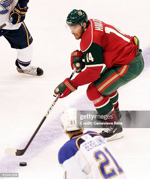 Martin Havlat of the Minnesota Wild skates with the puck during their preseason game against the St. Louis Blues at the Xcel Energy Center on...