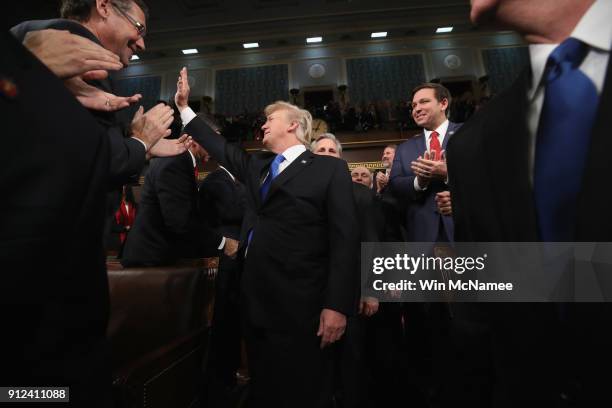 President Donald J. Trump arrives for the State of the Union address in the chamber of the U.S. House of Representatives January 30, 2018 in...