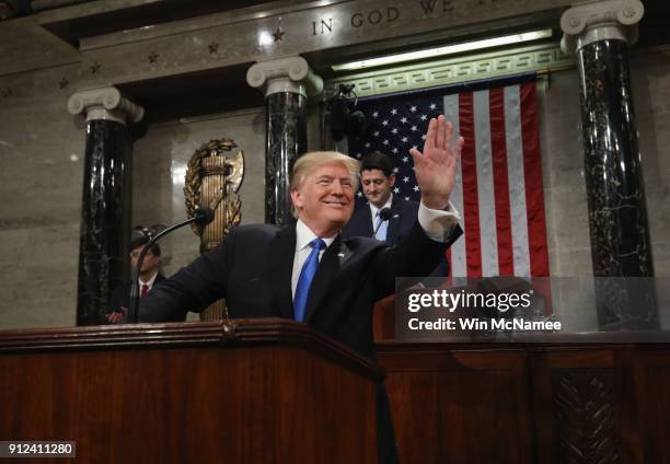 President Donald J. Trump waves as he arrives during the State of the Union address in the chamber of the U.S. House of Representatives January 30,...