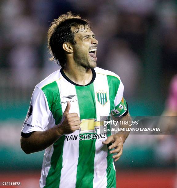 Argentina's Banfield Dario Cvitanich celebrates after scoring against Ecuador's Independiente del Valle during the Copa Libertadores match, at...