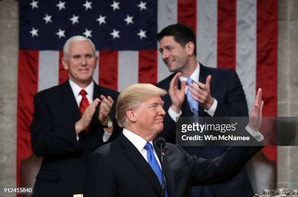 President Donald J. Trump waves during the State of the Union address as U.S. Vice President Mike Pence and Speaker of the House U.S. Rep. Paul Ryan...