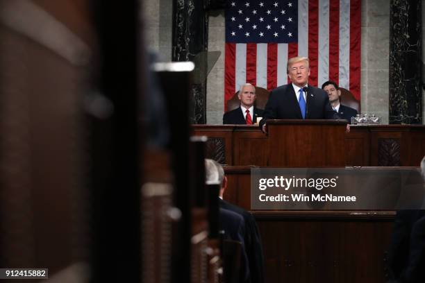 President Donald J. Trump delivers the State of the Union address as U.S. Vice President Mike Pence and Speaker of the House U.S. Rep. Paul Ryan look...