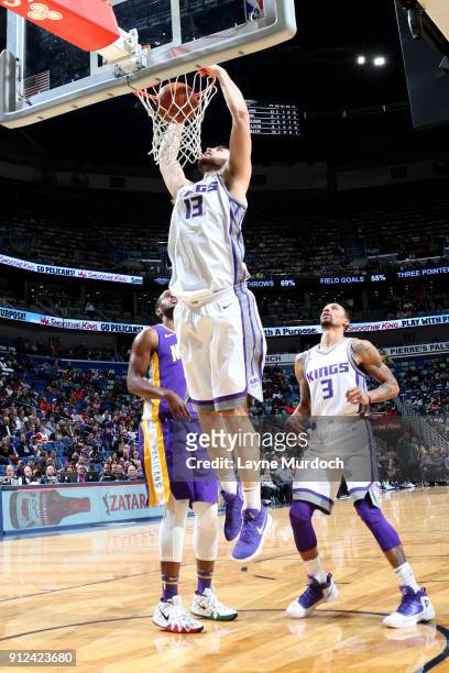 Georgios Papagiannis of the Sacramento Kings dunks the ball during the game against the New Orleans Pelicans on January 30, 2018 at the Smoothie King...
