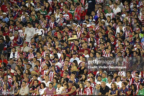 Chivas soccer fans watch the International Club Friendly match between Chivas de Guadalajara and Chivas USA at the Rose Bowl on September 23, 2009 in...