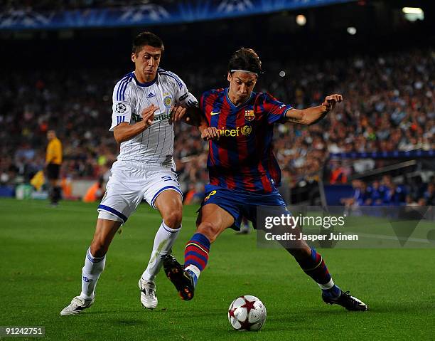 Zlatan Ibrahimovic of duels for the ball with Yevgen Khacheridi of Dynamo Kiev during the Champions League group F match between Barcelona and Dynamo...