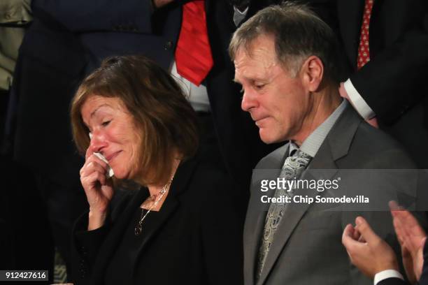 Parents of Otto Warmbier, Fred and Cindy Warmbier are acknowledged during the State of the Union address in the chamber of the U.S. House of...