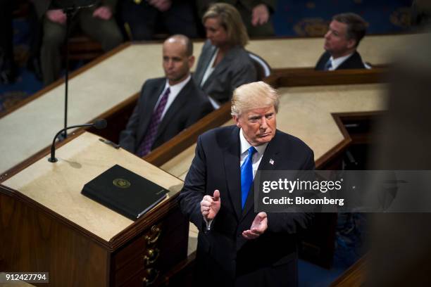 President Donald Trump pauses while delivering a State of the Union address to a joint session of Congress at the U.S. Capitol in Washington, D.C.,...